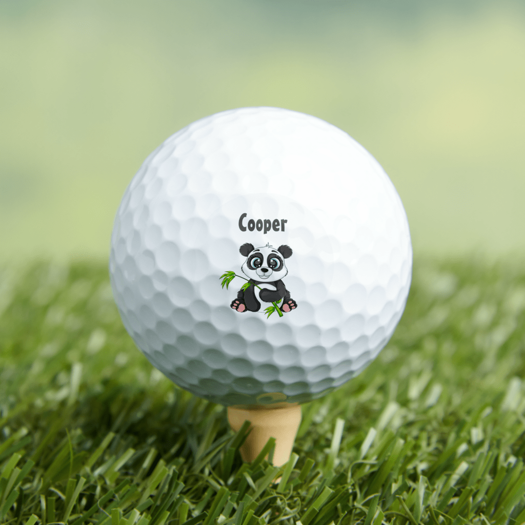 Personalized junior golf ball with panda design and child's name.