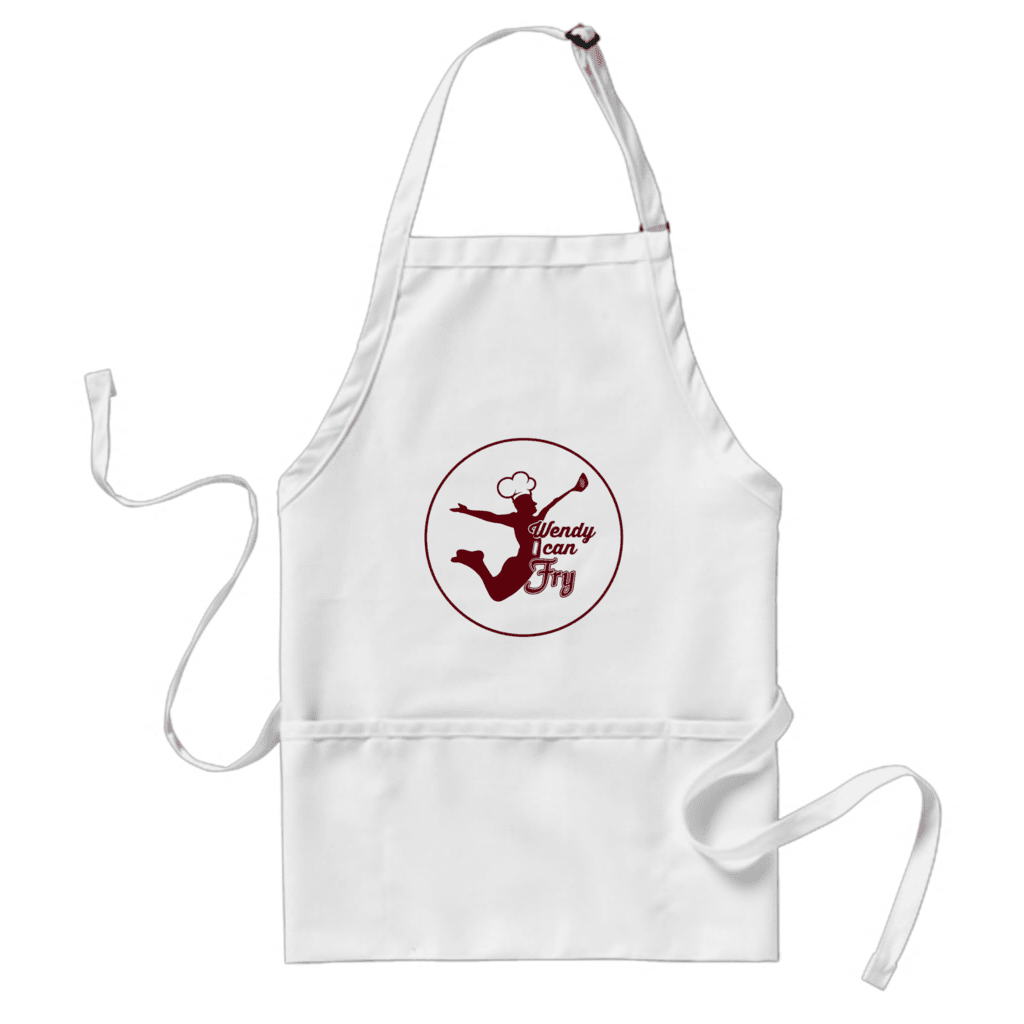 Wendy I can fry - funny apron with an image of a man leaping with a spatula